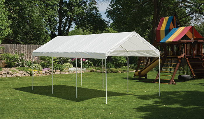 A canopy provides shade next to a play structure.