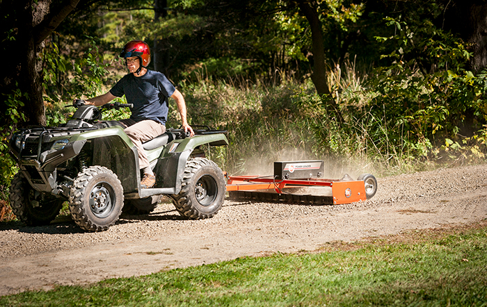 Power Grader in use behind an ATV