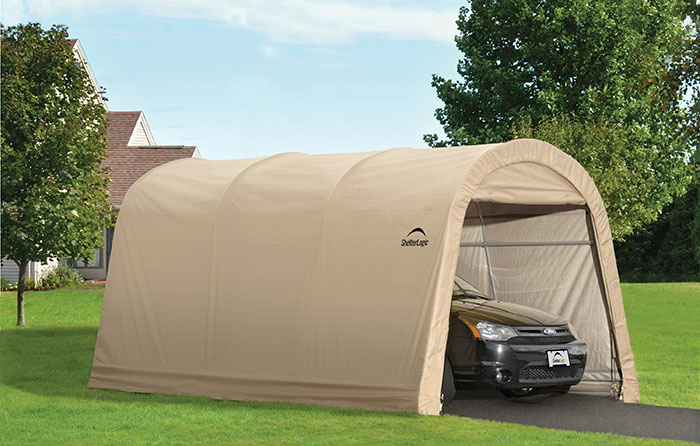 A portable carport provides shade for a parked car.